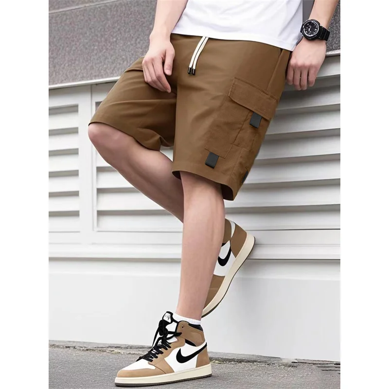 2025 صيف جديد نمط الرجال لون نقي عادية الرياضة الركض البضائع السراويل الرجال فضفاضة مستقيم الساق متعددة جيب خمسة أرباع السراويل ﻿