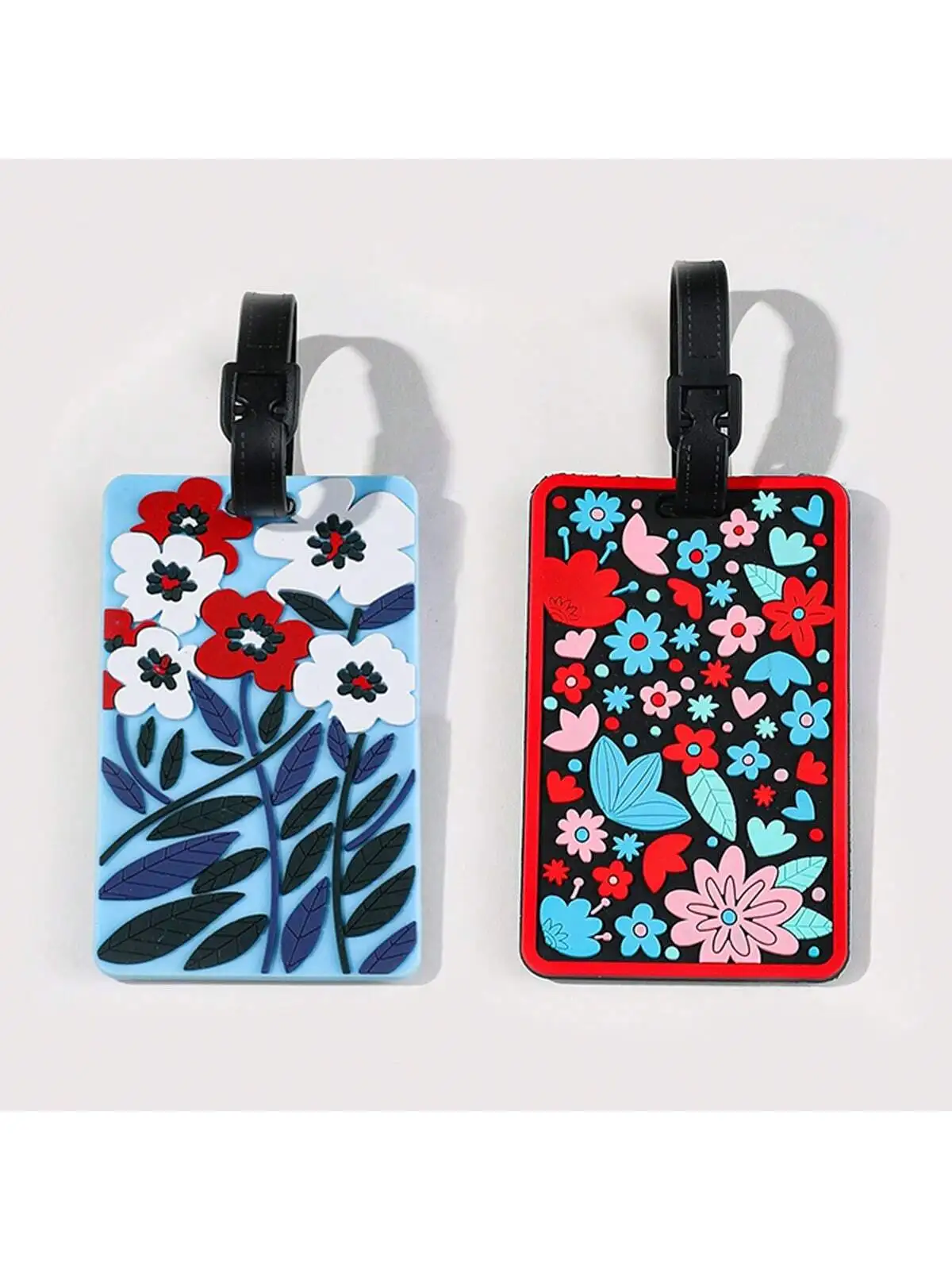 Luggage tags with floral patterns, aircraft boarding passes with colored luggage identifiers, and travel identification tagsA-DH