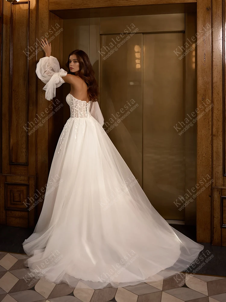 ชุดแต่งงานหรูหราทรงเอไลน์ ผ้าทูลล์หลายชั้น แขนพองยาว สำหรับผู้หญิง  ชุดเจ้าสาวแบบสั่งตัดได้ ปี 2025