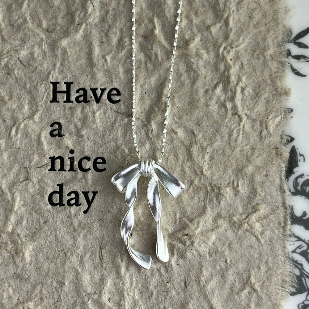 جديد الأرز حبة ضئيلة القوس قلادة الراقية الانحناء بسيط القوس الملحقات خمر سلسلة الترقوة