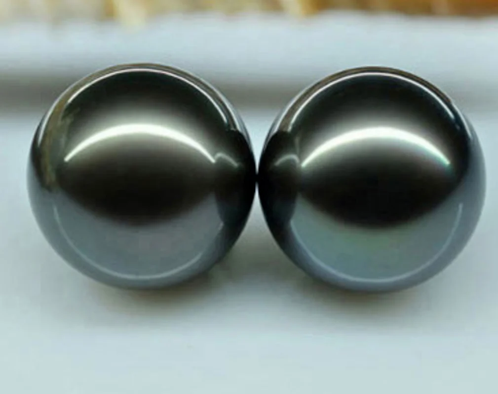 

Stunning Pair of 10-11mm Tahitian Round Black Green Loose Pearl Half Drilled