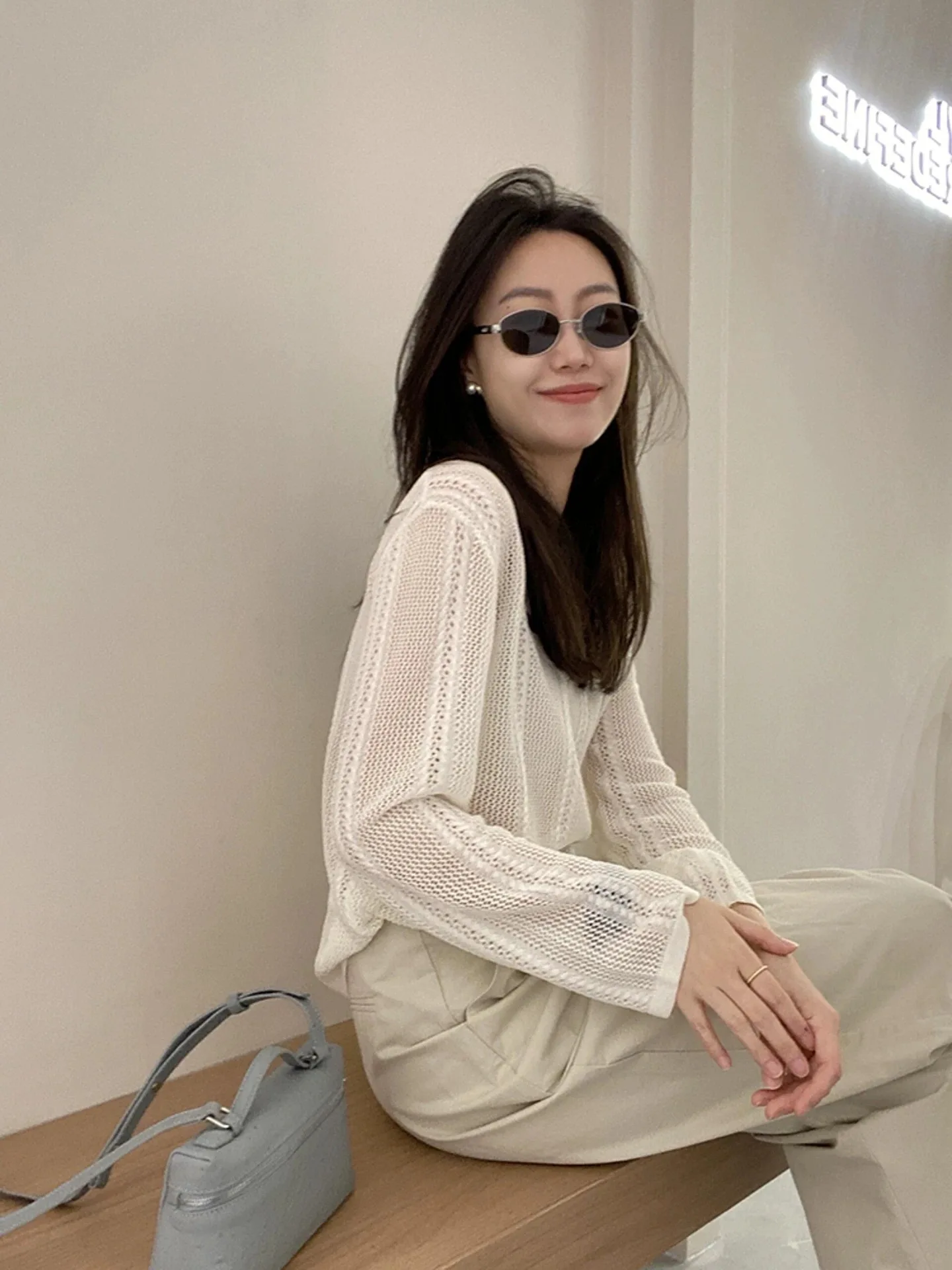Korean hollowed out knitted sweater women's loose long sleeved sun protection shirt