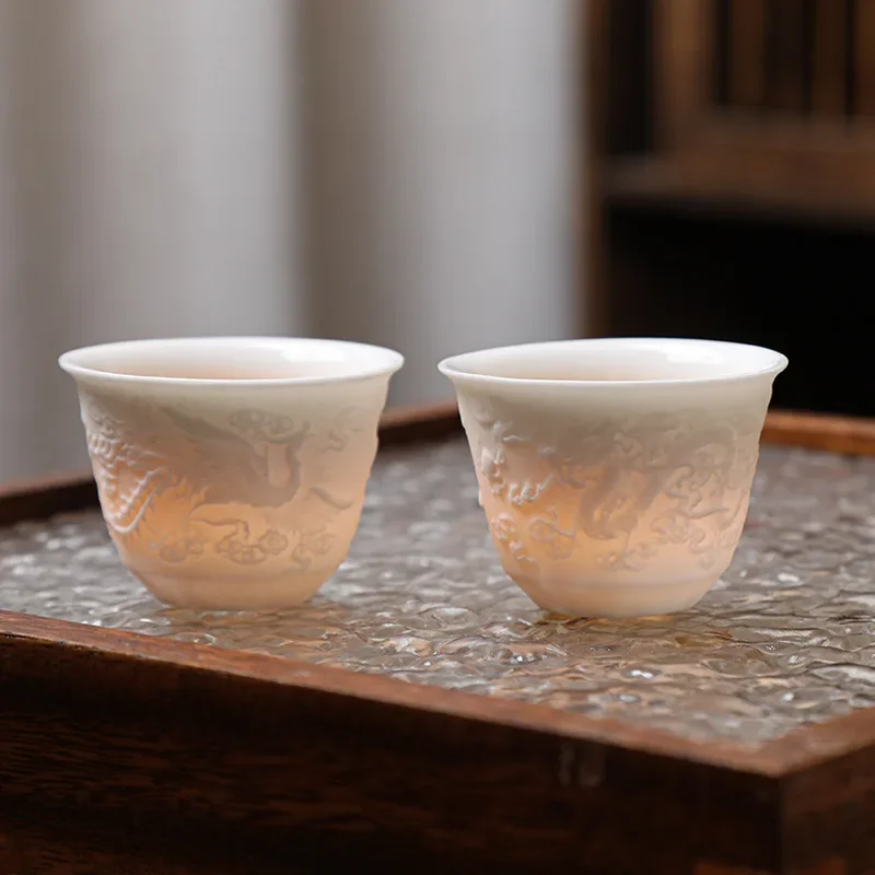 Relief Xishi Pot Fengming Pot Dragon and Phoenix Chengxiang Teapot Luxury White Cups Plain-fired Ceramic Kung Fu Travel Tea Set