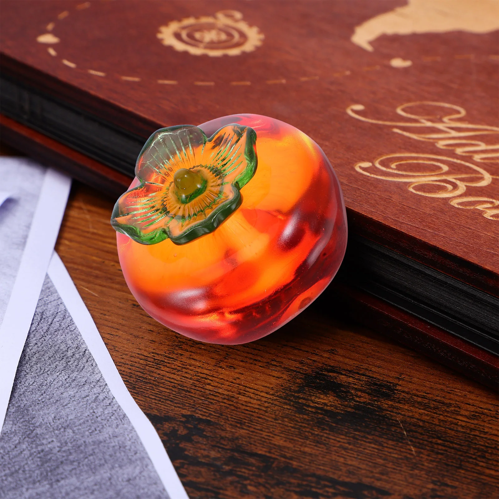 

2Pcs Crystal Persimmon-Shaped Paperweight Lifelike Design Functional Desk Tool for Calligraphy Practice Writing and Craft Work