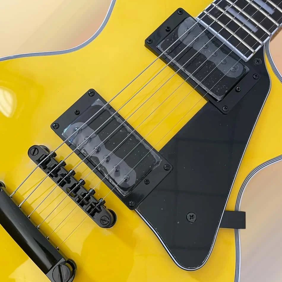 Yellow 6-string electric guitar with black hardware, rosewood fingerboard, and mahogany body view 3