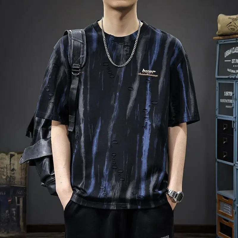 

Fashion O-Neck Printed Letter Hole Casual T-Shirts Men Clothing 2025 Summer New Loose Short Sleeve Korean Tops Punk Tee Shirts