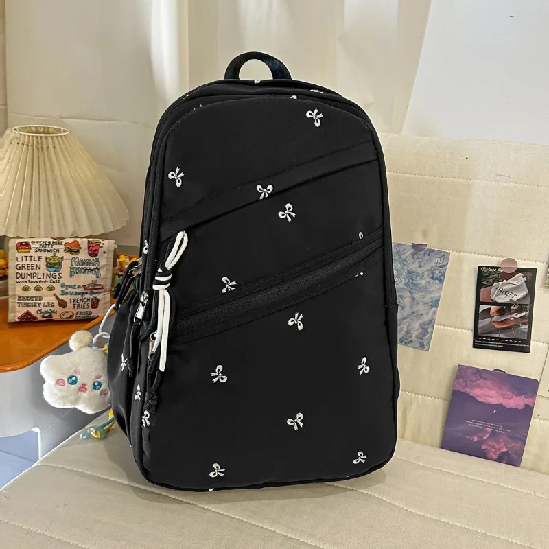 

2026 Spring/summer New Versatile Bags Large Capacity Student Commuting Backpacks Nylon Bow Embroidery Fashion Backpacks