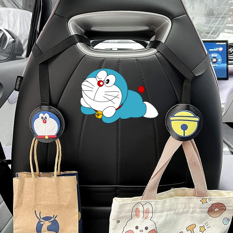 Gancho para reposacabezas de coche Doraemon, ganchos para respaldo de asiento todo en uno de Anime, cordones de almacenamiento multifunción interiores, suministros de decoración, 2 uds.
