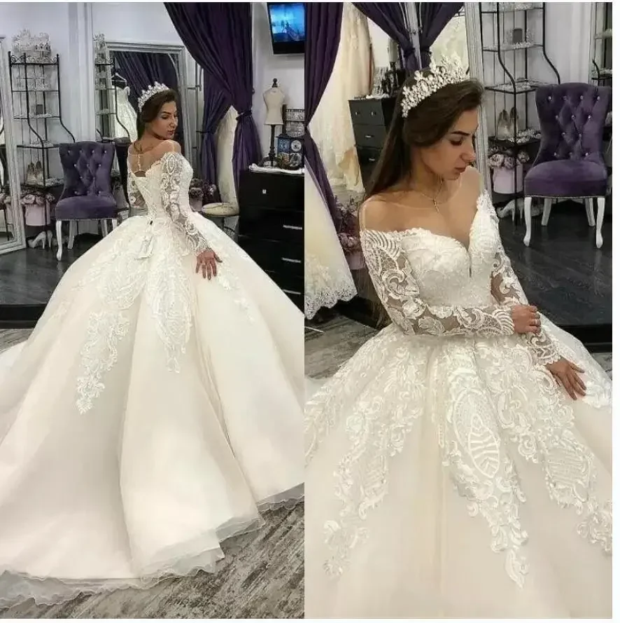 Op maat gemaakte trouwjurken met kanten appliqué Robe De Mariée Sweep/Brush train Korset Terug Lange mouwen Grote maten bruidsjurk