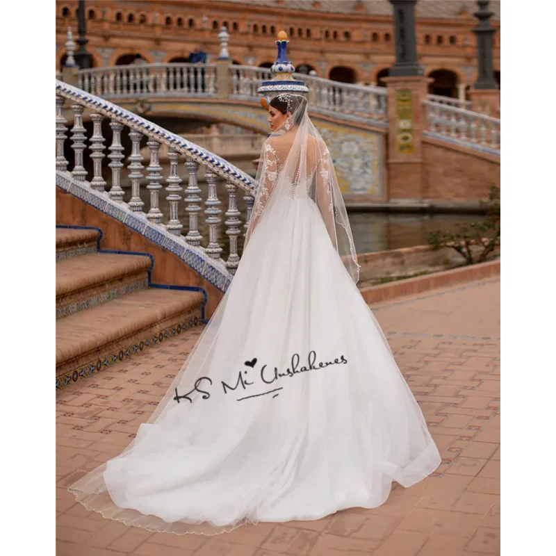 2024 Elegant Ball Gown Wedding Dresses O Neck Long Sleeve Beads Lace Bridal Dress Princess Church Wedding Gowns Illusion