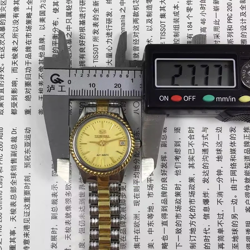 

tooth edge strips, yellow surface single calendar room, gold and steel belt, fully automatic mechanical women's watch