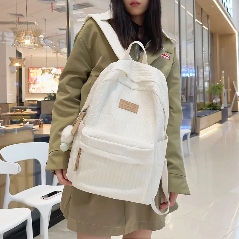 Women Soft Textured White Backpack Casual School Bag With Pom Pom Pendant For Students Daily Use Travel