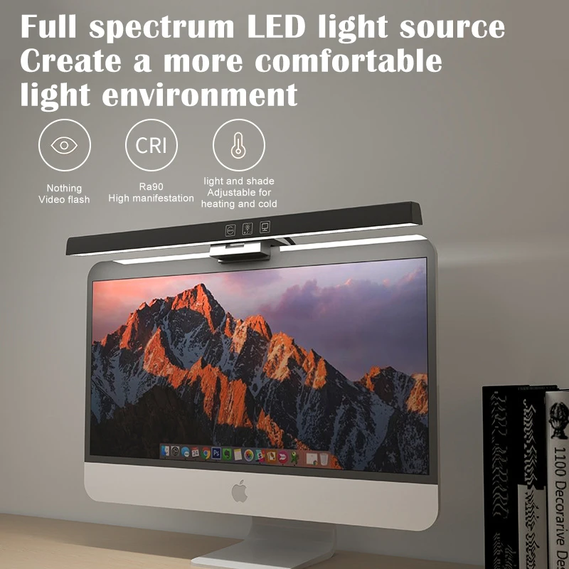 Multiple computer screens, stylish hanging lights, modern curved chandeliers, bright colors, and adjustable RGB lights.