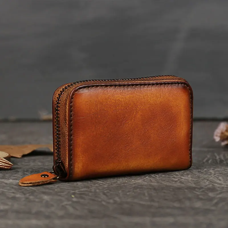 Skórzany mini portfel dla kobiet i mężczyzn z kieszonką na monety, 9 przegródek, wielofunkcyjny portfel na zamek błyskawiczny, kompaktowy organizer na karty i pieniądze.