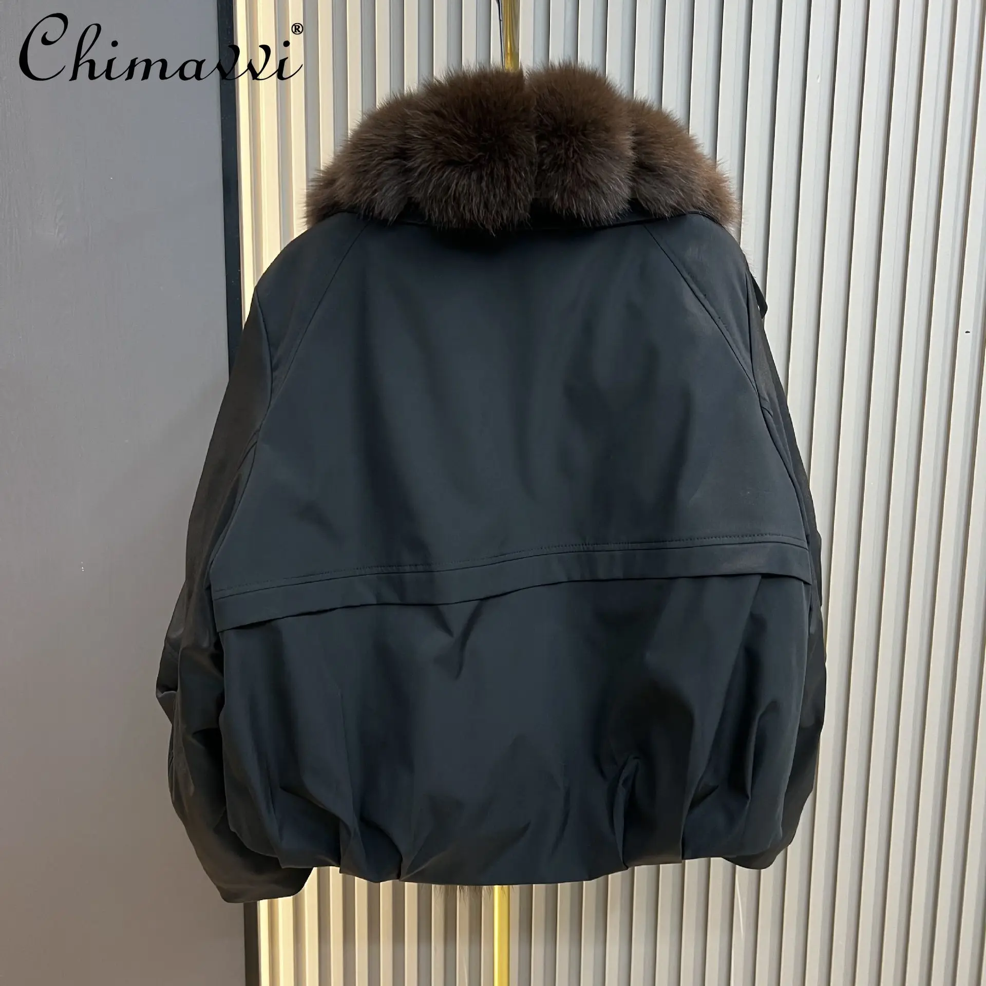 Piumino d'oca pesante Collo in pelliccia di volpe 2025 Inverno Nuova moda Manica lunga Allentato Caldo Elegante Parka da donna Cappotto in pelliccia sintetica
