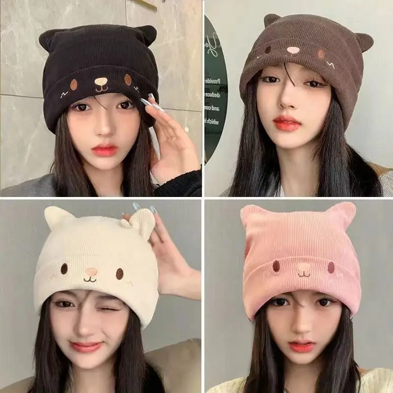 1piece of women's cute expression winter knitted hat, woolen hat for autumn and winter, warm ear-protecting head-covering hat.