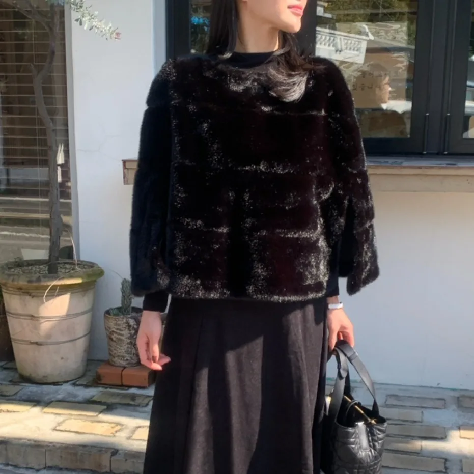 Elegancki damski płaszcz futrzany koreański styl jesień zima nowy design retro modny szal luźny krój długość ort