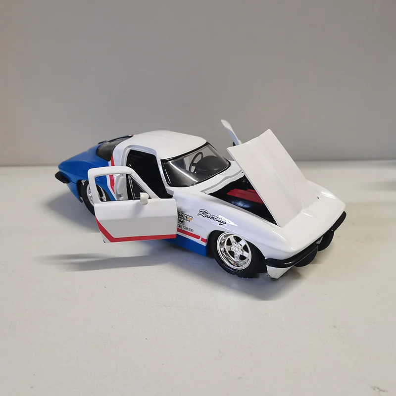 جادا 1:24 مقياس سبيكة 1963 كورفيت ستينغراي العضلات دييكاست لعبة صغيرة سيارة محاكاة النموذج الكلاسيكي المقتنيات عرض تذكارية #4