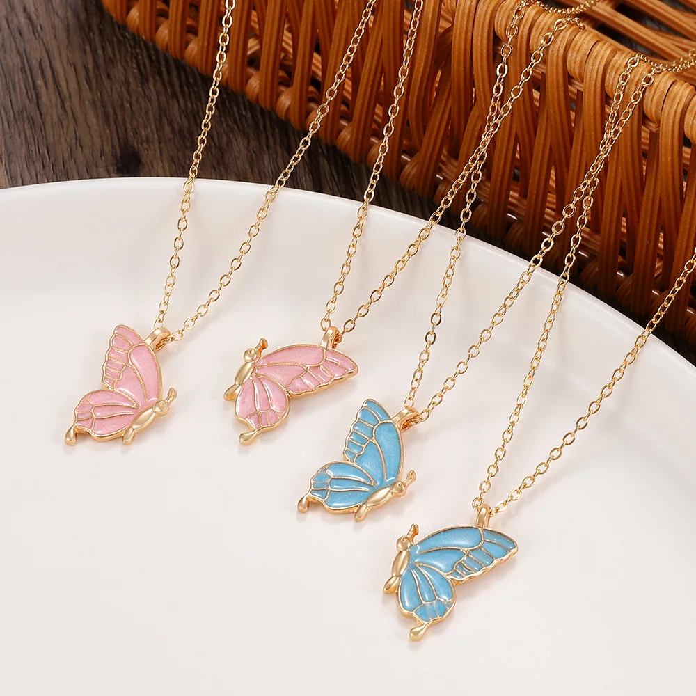 Collier double papillon goutte d'huile, ensemble d'amitié papillon créatif, chaîne de clavicule, cadeau pour petite amie