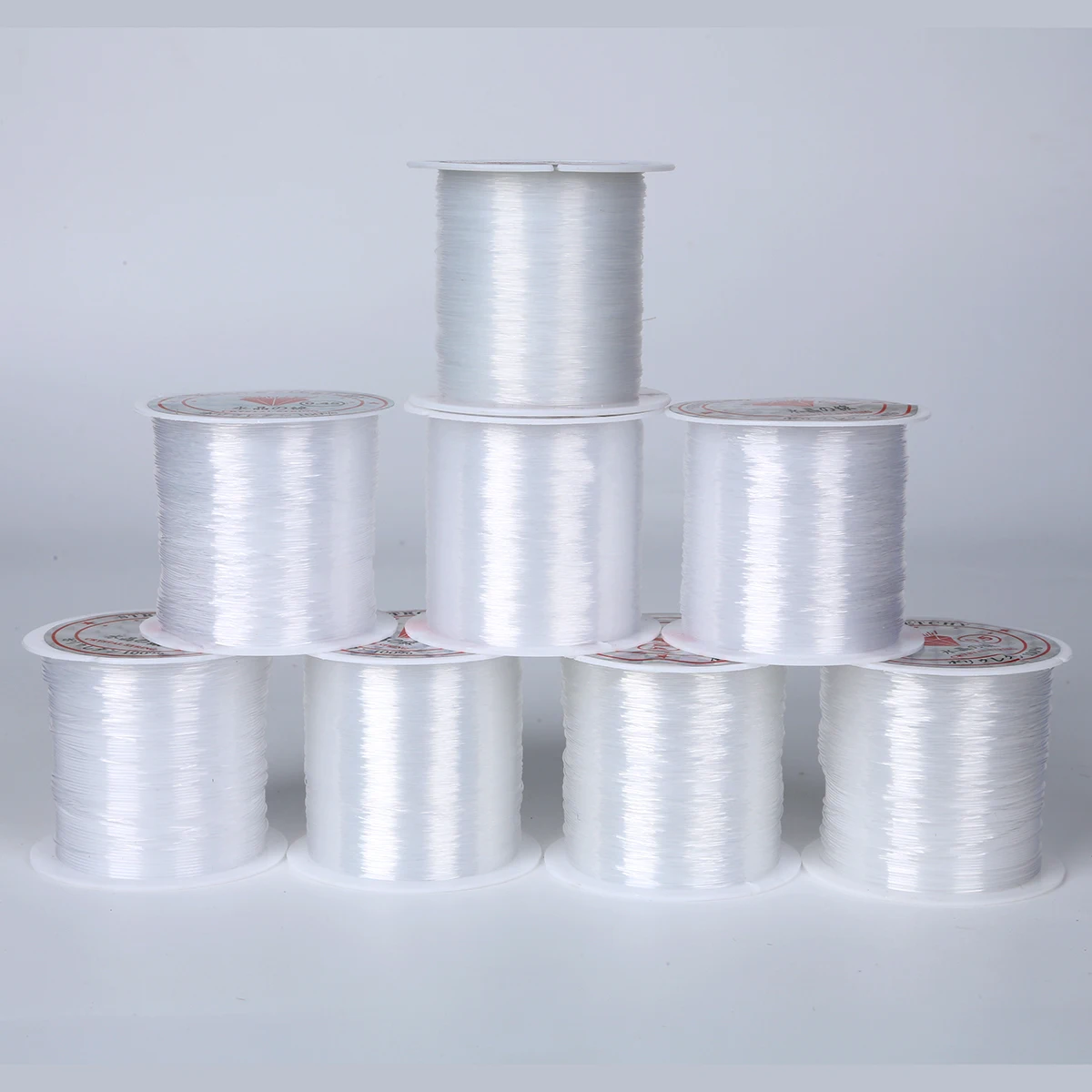 خط صيد أحادي الشعيرات من النايلون غير المرئي - قوي ومتين للحرف اليدوية وصناعة المجوهرات وأكاليل البالونات والديكور