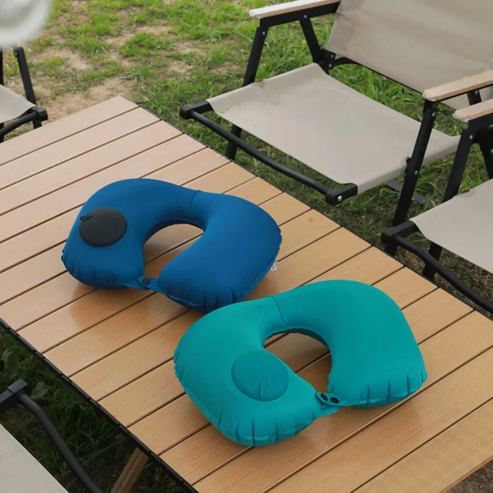 Manual press type inflatable U-shaped pillow for leisure travel, folding and portable
