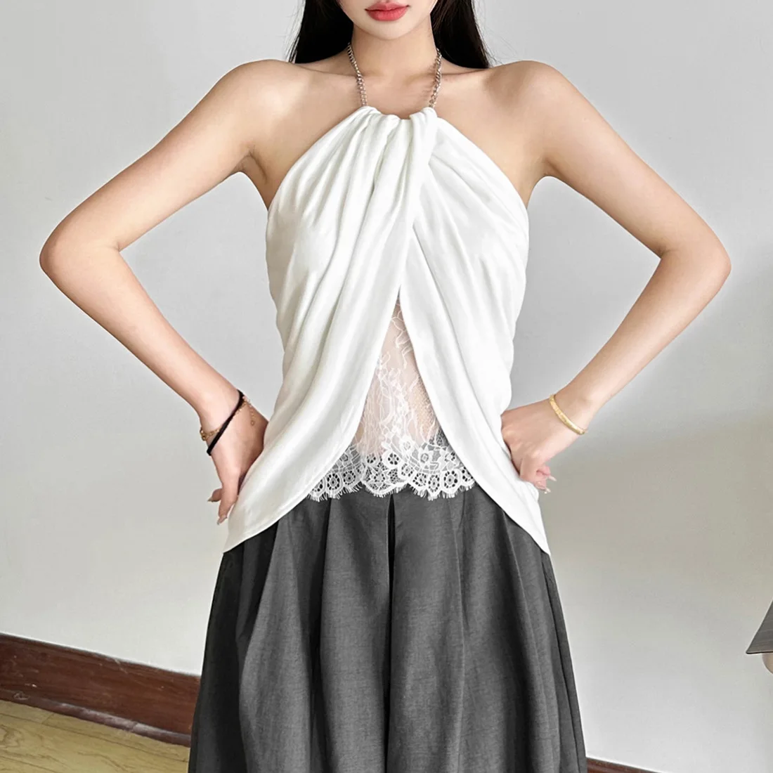 Vendita calda di alta qualità all'ingrosso 2025 nuova ragazza piccante temperamento sexy senza maniche backless lace up slim fit top abbigliamento donna