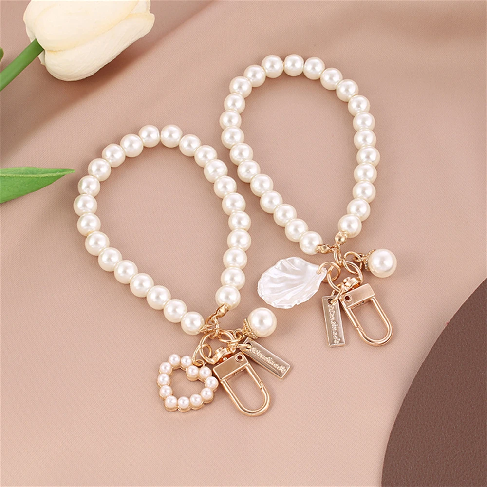 

Elegant Imitation Pearl Wrist Strap Keychains with Shells Pendant Fashion Car Keyring Women Bag Ornament Jewelry Accessories