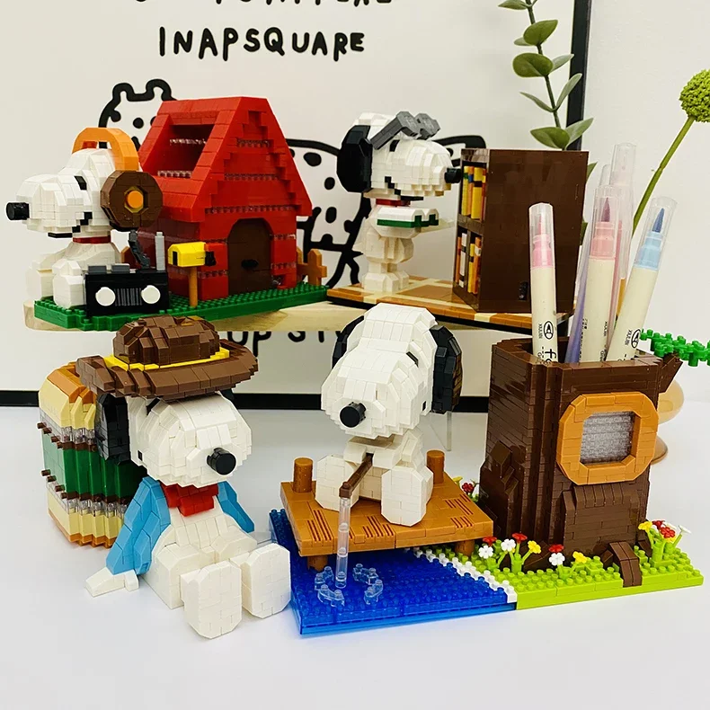 Rest Snoopy Micro bloques de construcción música pesca Snoopy portalápices modelo 3D lindo rompecabezas Mini ladrillos figura juguetes para regalo de cumpleaños