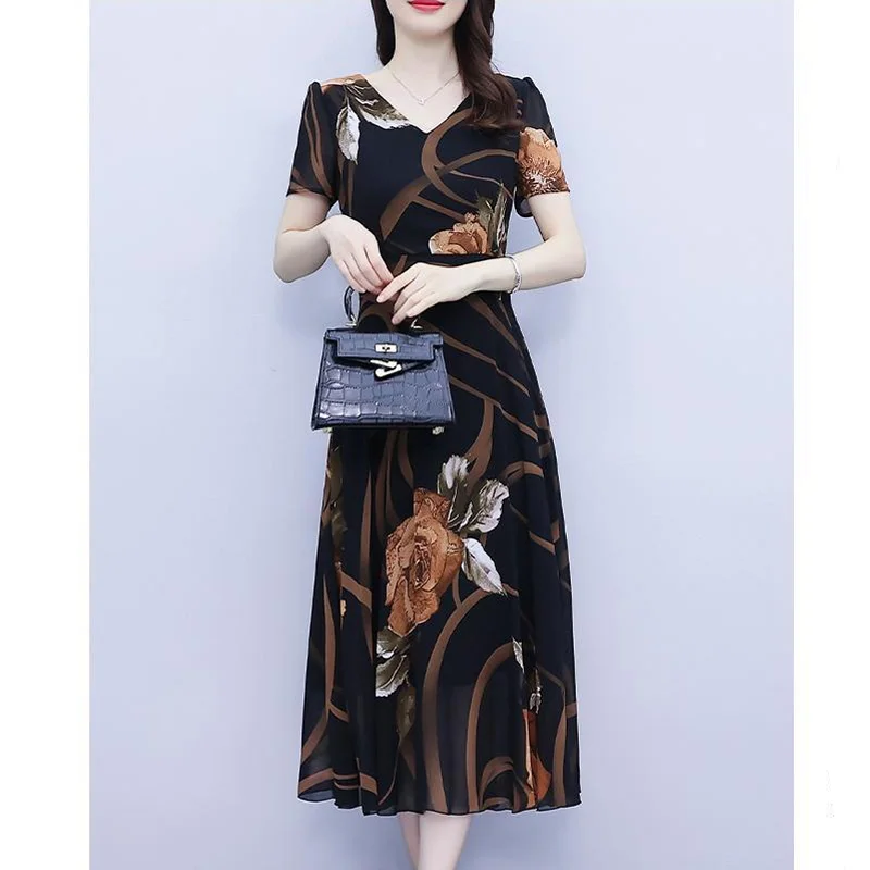 2023 New Summer Fashion Trend Commuting Minimalist V-neck Fresh Print Slimming Waist Covering Belly Casual Vacation Dress