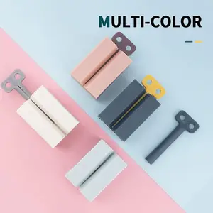 Toothpaste squeezer, roller tube toothpaste squeezer with frosted handle, toothpaste holder, vertical bathroom organizer