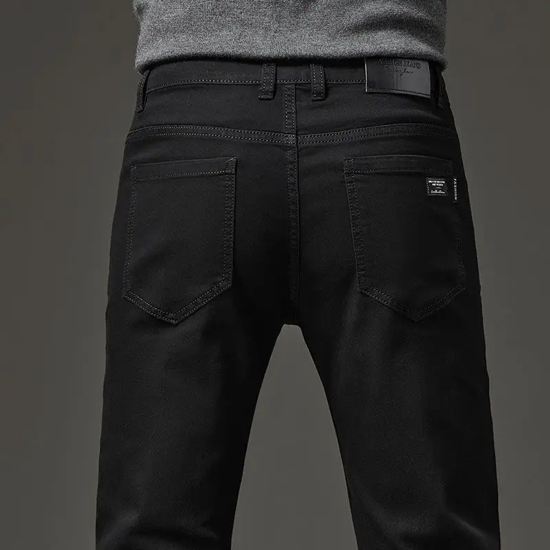 Men's autumn and winter hot jeans elastic small straight leg pants black gray micro elastic zipper fashionable versatile jeans