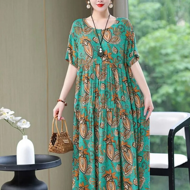 2024 New Elegant Summer Women\'s Round Neck Printed Patchwork Pocket Fashion Versatile Short Sleeve Loose Medium Length Dress