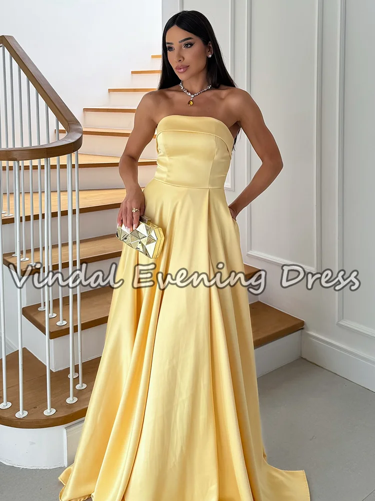 فساتين حفلة موسيقية أنيقة باللون الأصفر على شكل حرف A من Vindal بطول الأرض بدون أكمام من الساتان بدون حمالات وفتحة جانبية لحفلات الزفاف حسب الطلب