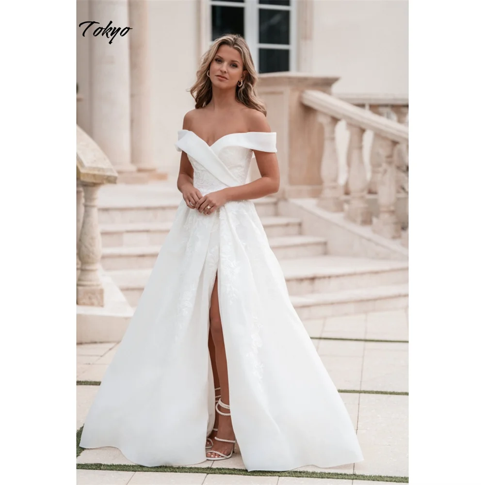 東京カスタマイズホワイトオフショルダーウェディングドレスノースリーブジップサイドハイスプリットブライダルベールコートトレインAラインウェディングドレス