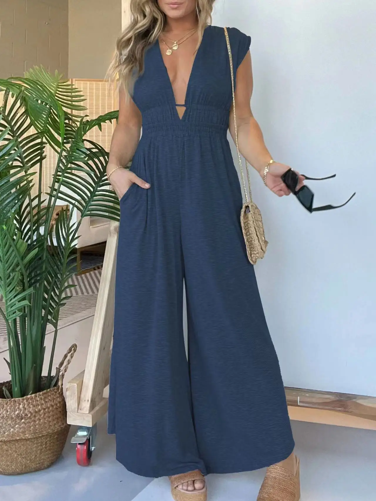 Damen ärmellose V-Ausschnitt Jumps uit mit weitem Bein lange Party hose hohe elastische Taille sexy neue lange Hose mit weitem Bein Freizeit mode