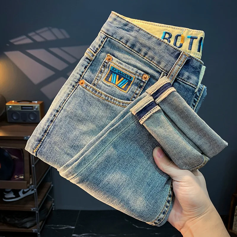 Celana jins pria musim panas, celana denim mode Semua cocok kasual dicuci, celana ketat melar Slim fit, katun kelas atas