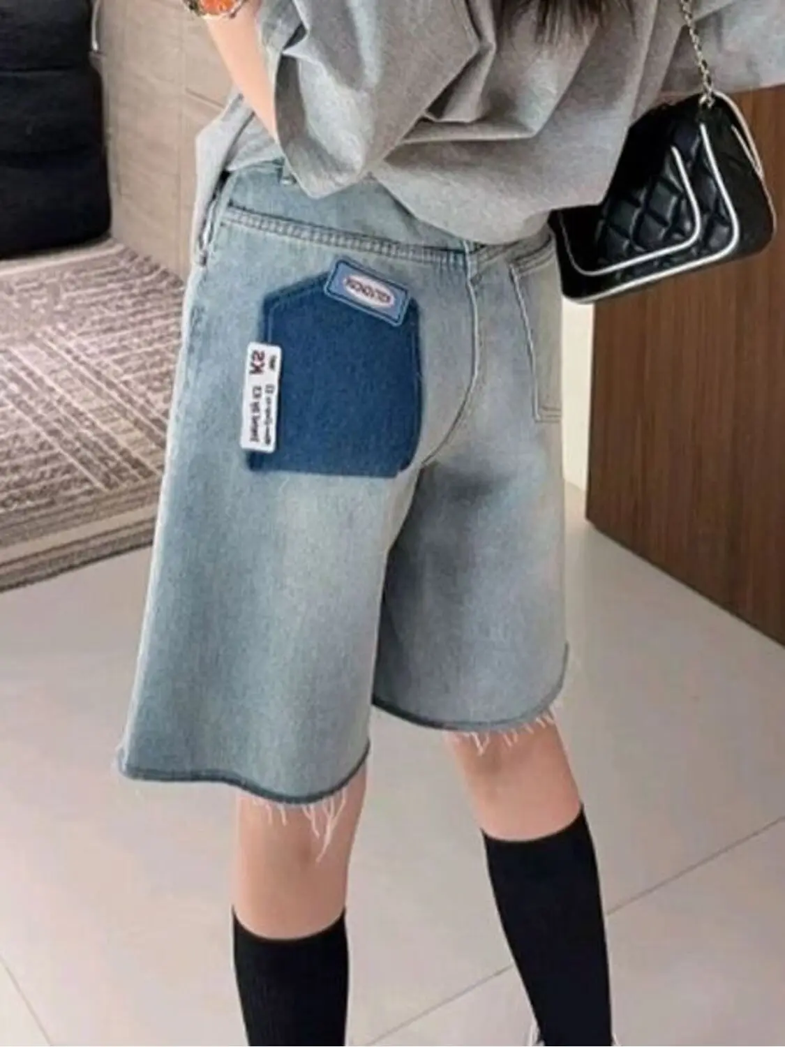 

Women's Vintage Washed Denim Bermuda Shorts Patch Pocket Raw Hem Mid-Length Jean Shorts