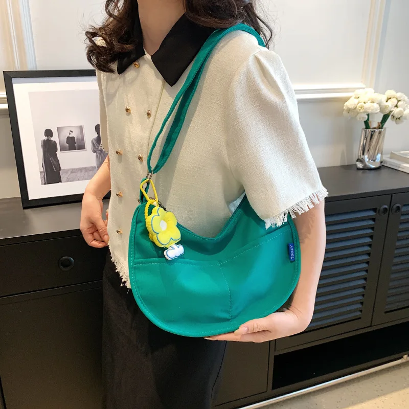 New solid color women's chest bag large capacity travel design belt bag women's new straddle large capacity canvas bag