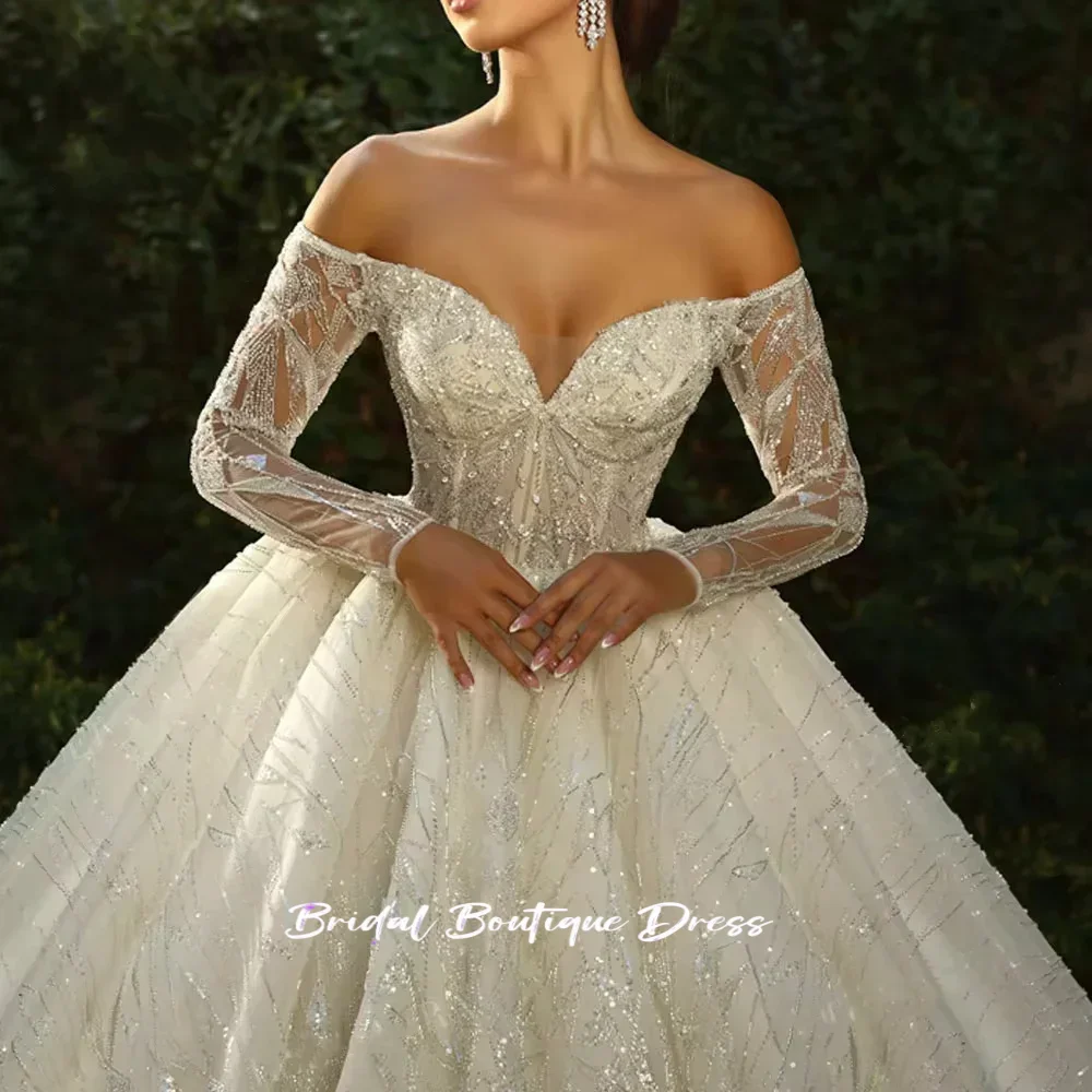 Vestidos de novia elegantes personalizados, vestidos de baile brillantes con cuentas brillantes, encaje nupcial con hombros descubiertos, Vestido de tren de manga larga