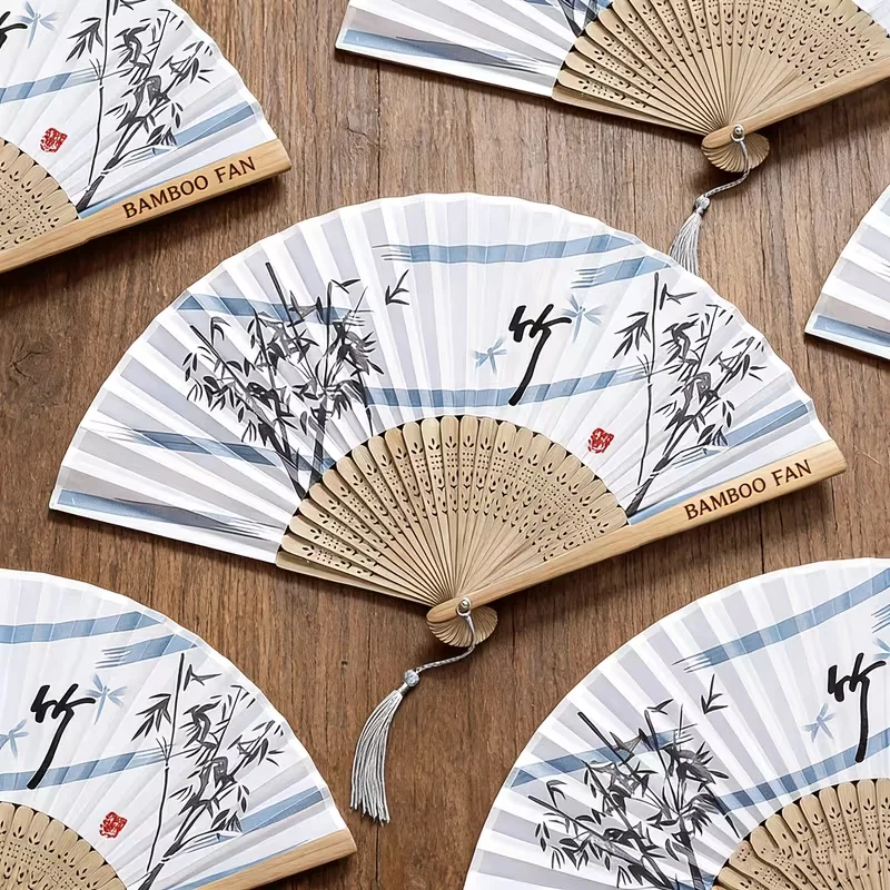 Customized and Personalized Exquisite Chinese Ancient Style Bamboo Folding Fan with Laser Engraving - the Perfect Luxurious Gift for Any Occasion, Perfect for Creating a Photo-Worthy Atmosphere, as a Cheongsam Accessory, Suitable for Home Decor and Guest Gifts, for Weddings and Corporate Gifts, and for Business and Holiday Gifts