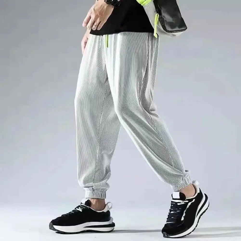 

Men Sweatpants 3D Cutting Men Wide Leg Running Loose Sweatpants Shrinkable Cuffs Fast Drying Loose Trousers Daily Clothing