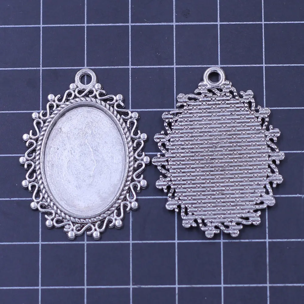 

50Pcs Silver Tone Flower Lace Oval Cabochon Cameo Frame Settings Pendants 3.8x2.9cm(Fit 24x18mm)