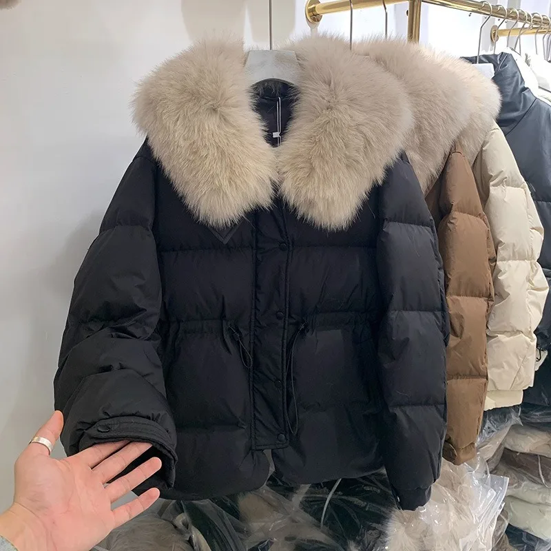 2025 Chaqueta de plumón de invierno para mujer, abrigo grueso y cálido de piel grande con cuello vuelto y plumón de pato blanco a la moda