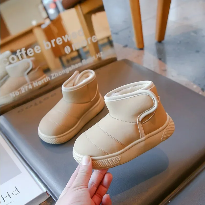 Stivali invernali per bambini addensare scarpe in cotone caldo peluche per ragazzi stivali Casual solidi per ragazze stivali da neve antiscivolo con