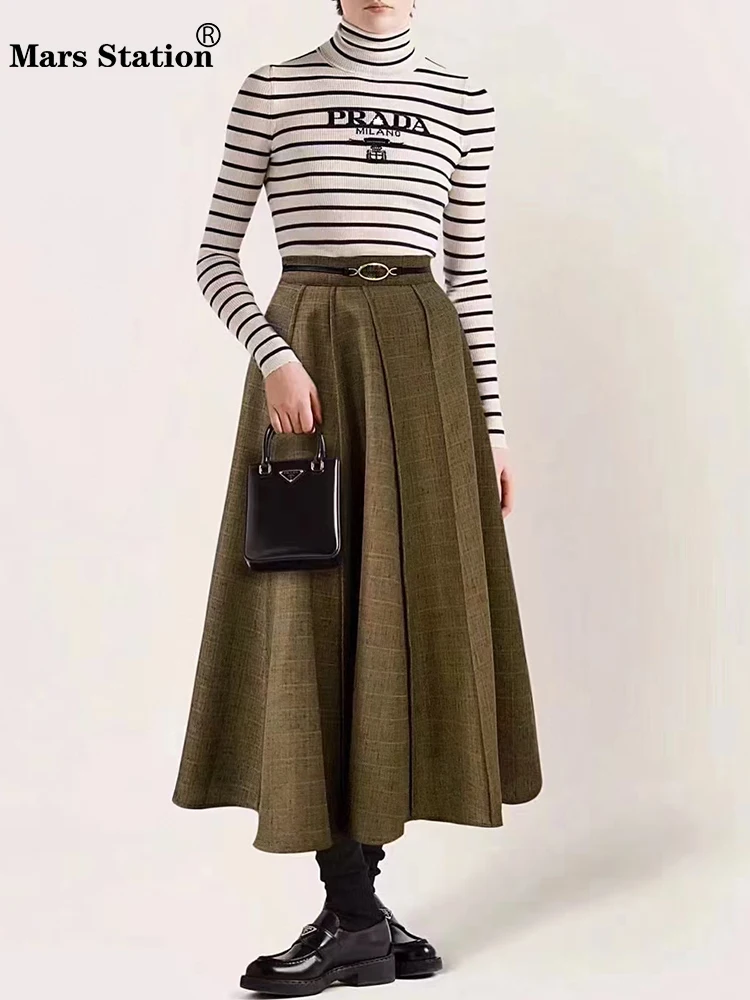 Designer vintage splicing hardware belt high-waist skirt 2024 fall ladies new fashion all-matching loose A-line pompon skirt