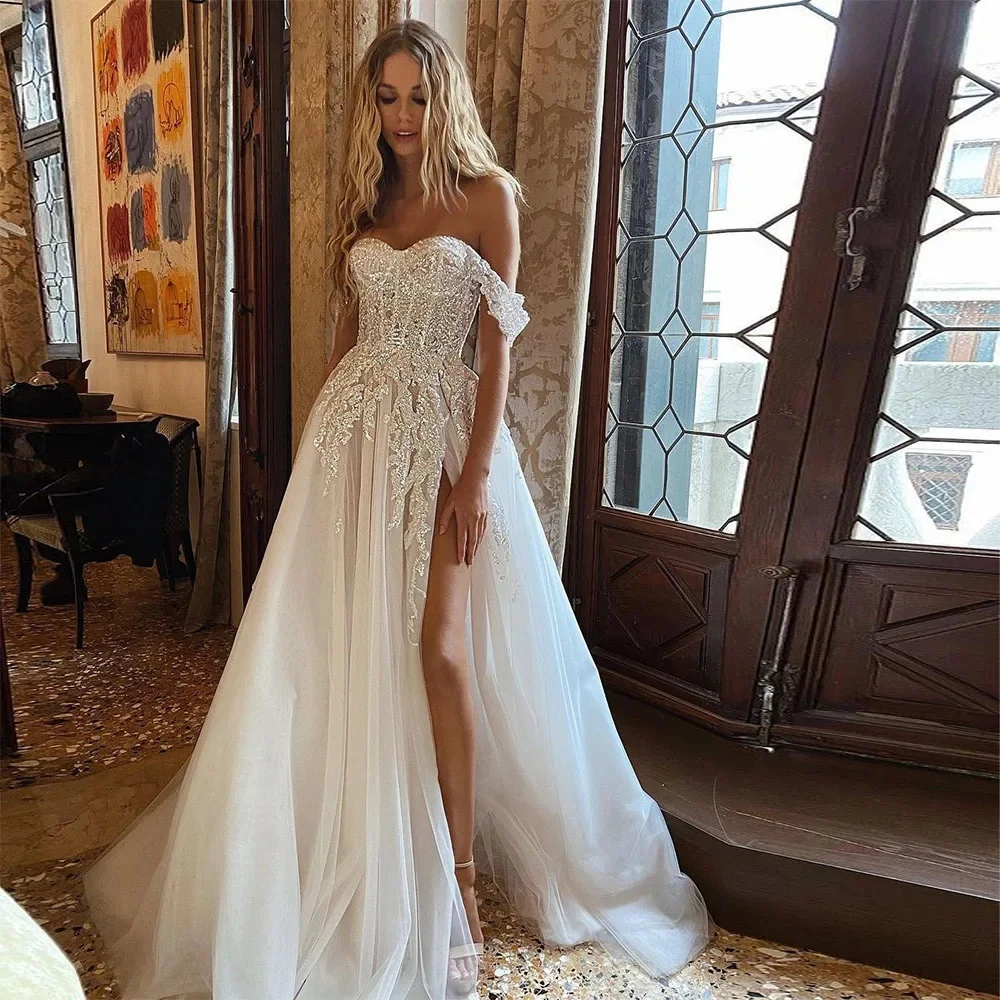 Vestidos de novia bohemios con cuentas de cristal, traje de novia de encaje y con apliques de línea a hombros descubiertos, escote Corazón, 2024