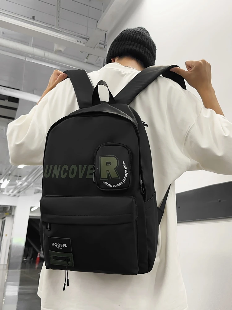 Multifunctional backpack men's fashion backpack simple and light student bag large capacity short-distance travel bag.