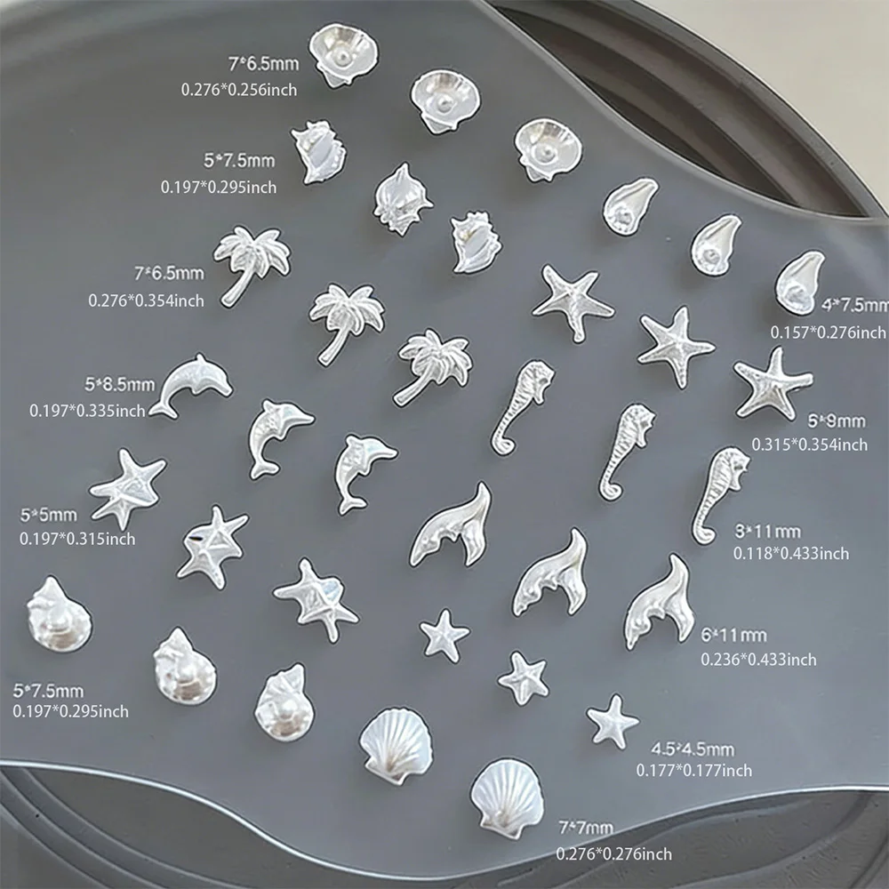 อุปกรณ์ตกแต่งเล็บ 3 มิติ รูปดาวทะเล เปลือกหอย ไข่มุกสีขาว 50 ชิ้น ลายต้นมะพร้าว ม้าน้ำ นางเงือก สำหรับตกแต่งเล็บธีมฤดูร้อน ชายหาด มหาสมุทร