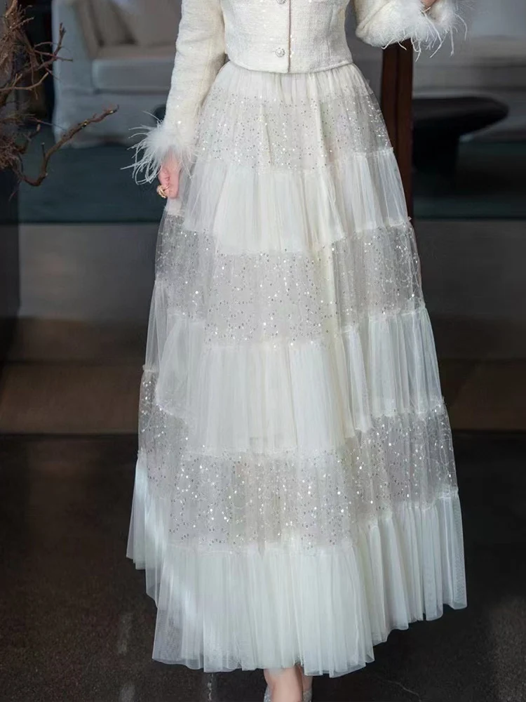 

Retro spring/summer 2025 new mesh stitching lace high waist skirt temperament elegant pleated sequins in the long A-line skirt.
