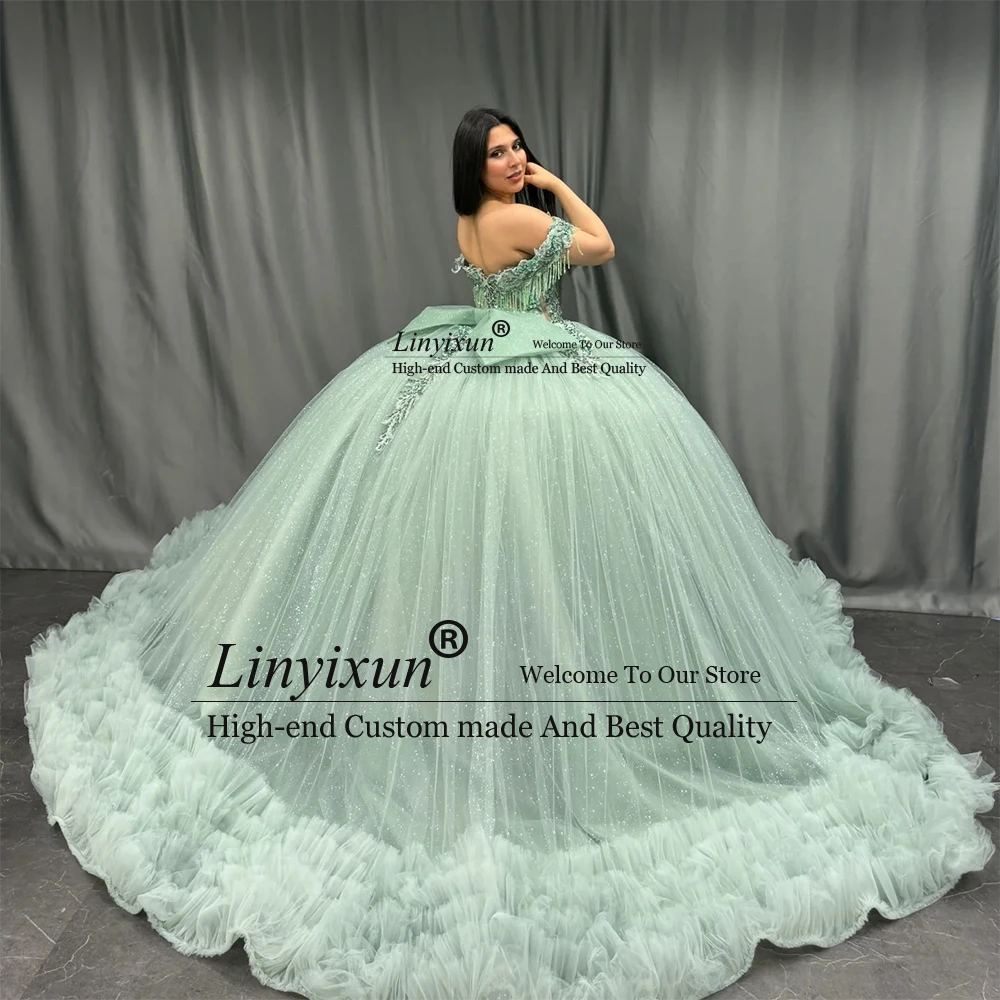 فساتين كوينسيانيرا الرائعة اللامعة لحفلات أعياد الميلاد من التل والكشكشة مخصصة بدون أكتاف فيستدوس دي 15 سنة 2025